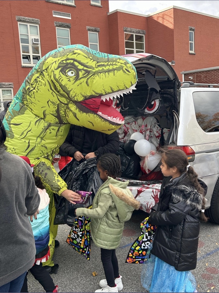 Who says a dinosaur can't give out treats?