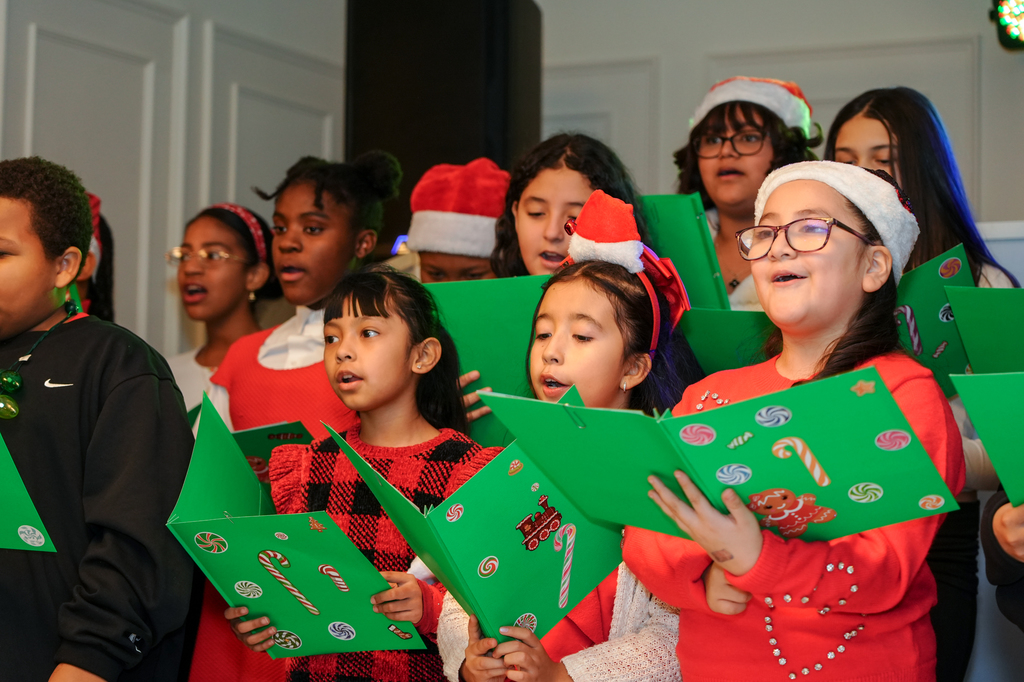 At the top of the month, the Enrico Fermi School choir sang in full Christmas spirit at the Office of the Aging Senior Citizens Holiday Party! 