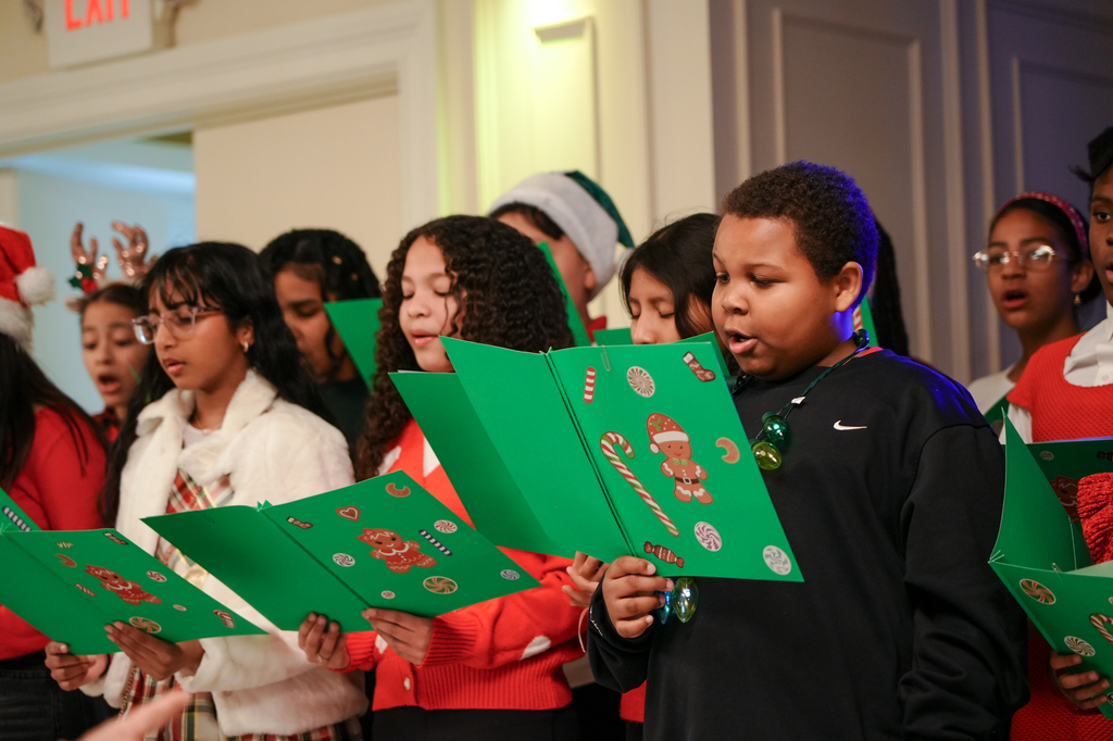  At the top of the month, the Enrico Fermi School choir sang in full Christmas spirit at the Office of the Aging Senior Citizens Holiday Party! 