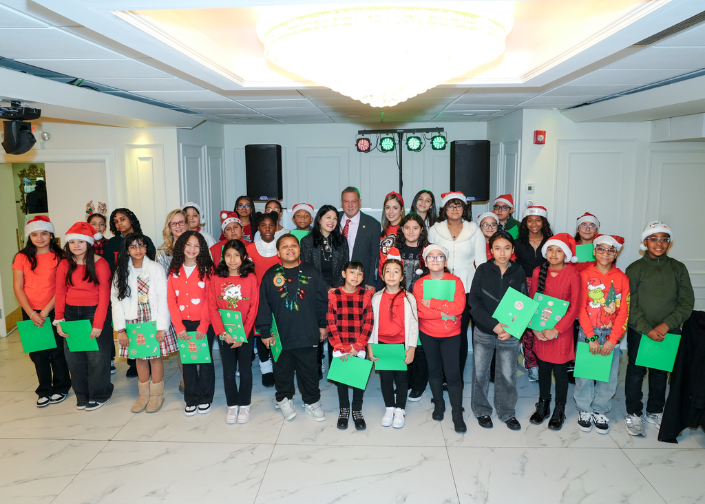  At the top of the month, the Enrico Fermi School choir sang in full Christmas spirit at the Office of the Aging Senior Citizens Holiday Party! 