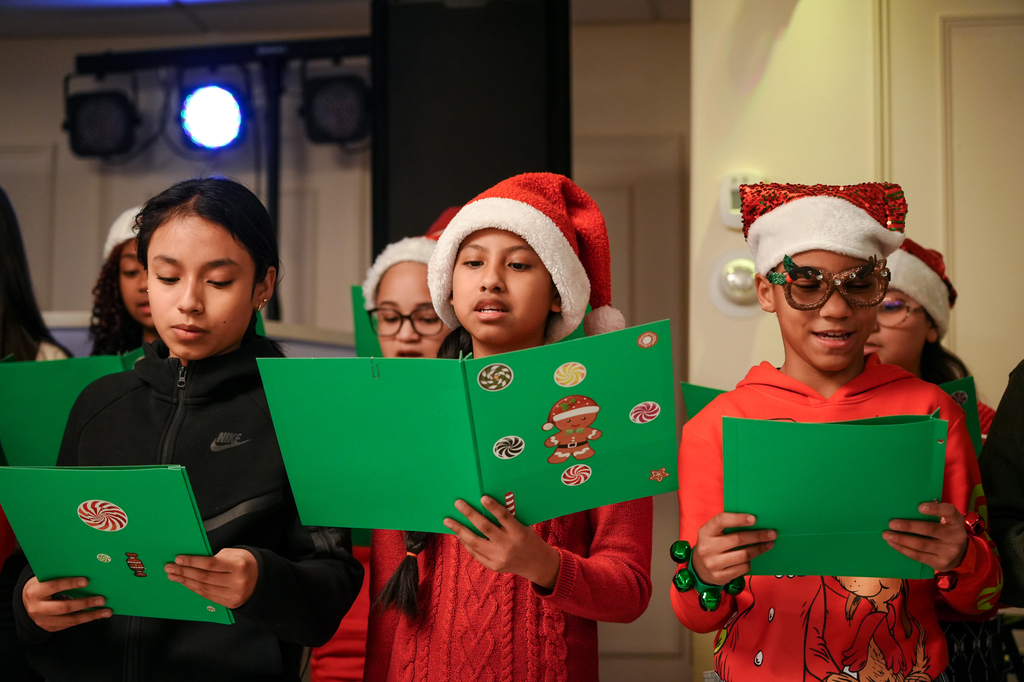  At the top of the month, the Enrico Fermi School choir sang in full Christmas spirit at the Office of the Aging Senior Citizens Holiday Party! 