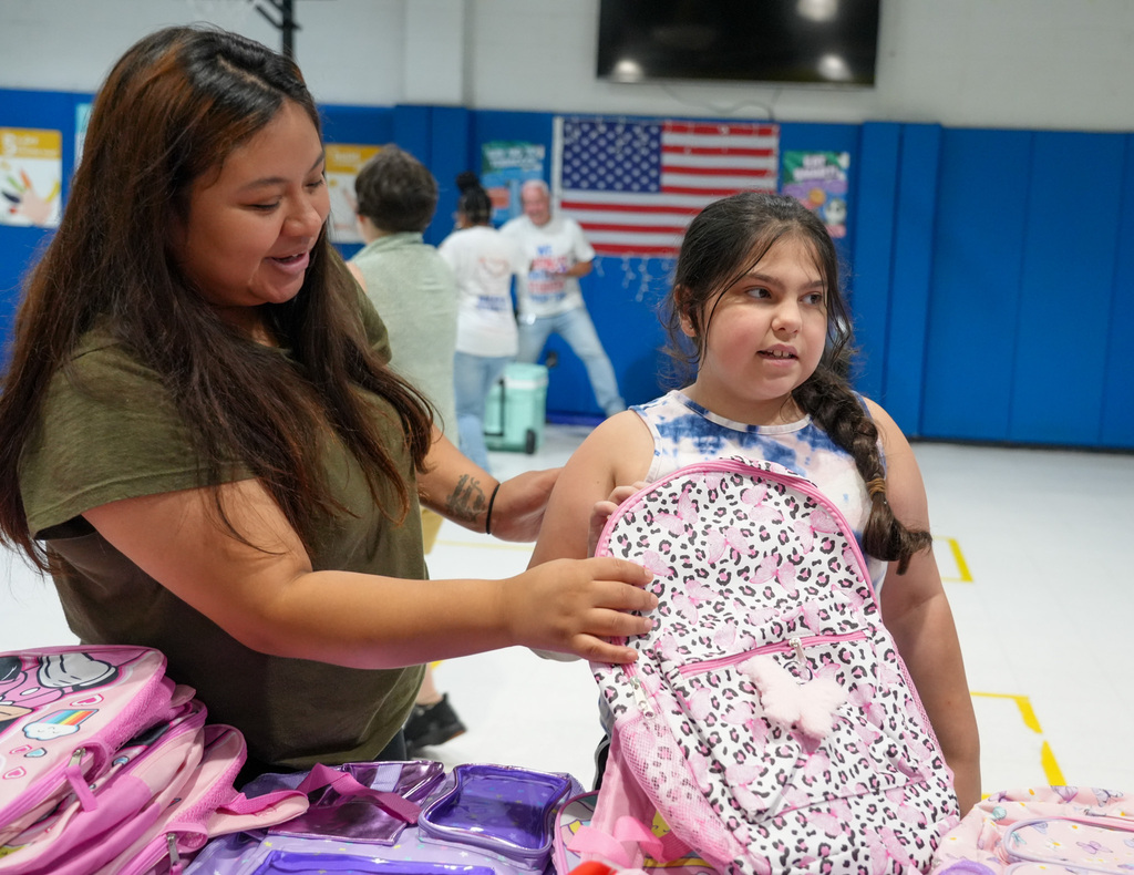 The Autism Project - FLOS Inc., hosted the 5th Annual Backpack Giveaway Celebration at the ESY program at WHS 29