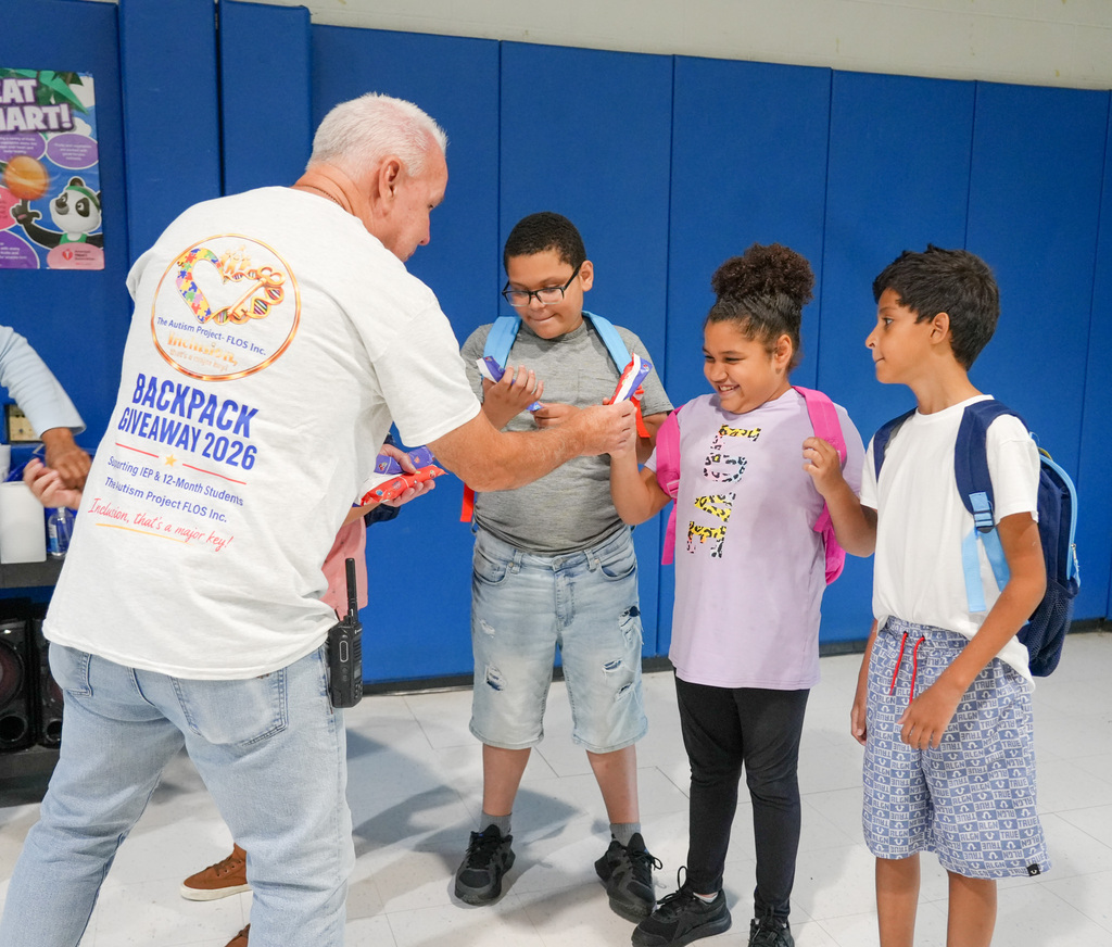 The Autism Project - FLOS Inc., hosted the 5th Annual Backpack Giveaway Celebration at the ESY program at WHS 29