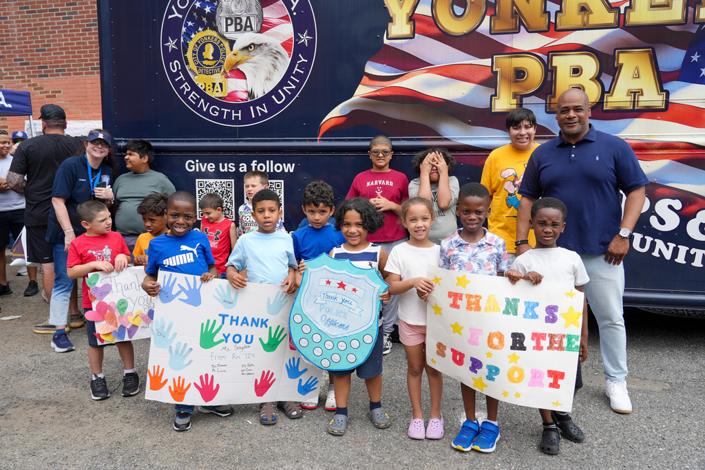 Today, the Yonkers Police Benevolent Association (PBA) returned to Yonkers Montessori Academy to host its annual BBQ for the Extended School Year (ESY) program, treating students and staff to a delicious lunch of burgers and hot dogs.