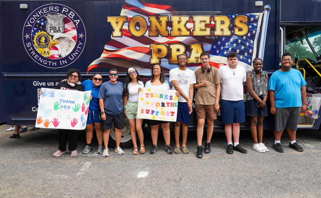 Today, the Yonkers Police Benevolent Association (PBA) returned to Yonkers Montessori Academy to host its annual BBQ for the Extended School Year (ESY) program, treating students and staff to a delicious lunch of burgers and hot dogs.