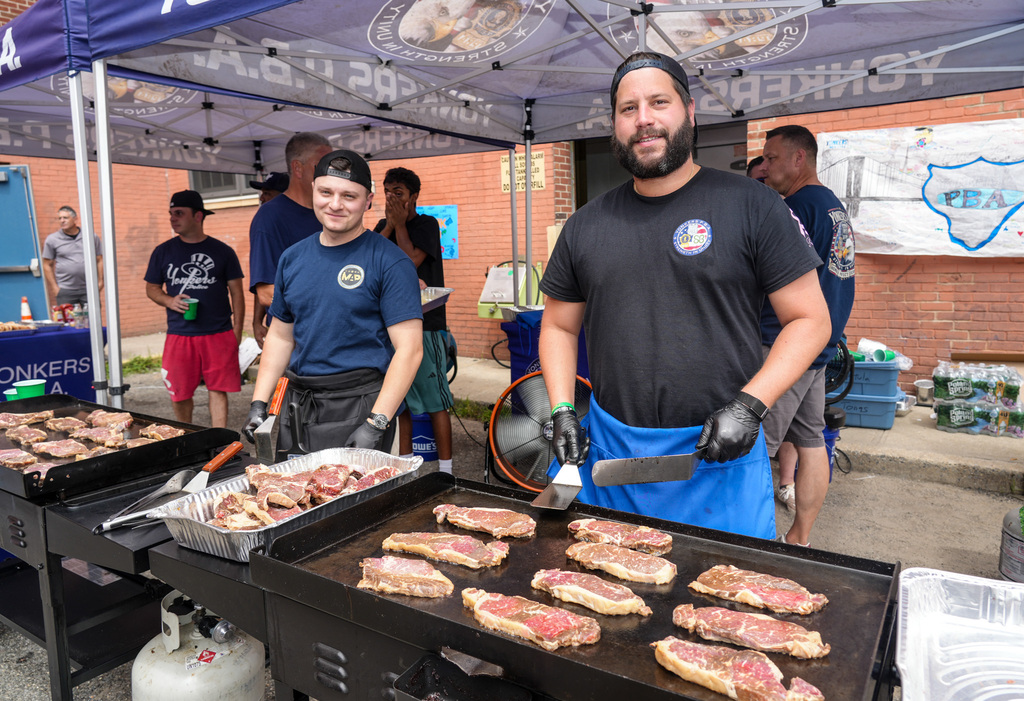 Today, the Yonkers Police Benevolent Association (PBA) returned to Yonkers Montessori Academy to host its annual BBQ for the Extended School Year (ESY) program, treating students and staff to a delicious lunch of burgers and hot dogs.