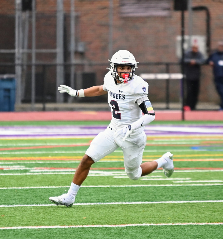 Omar Areche running during football game