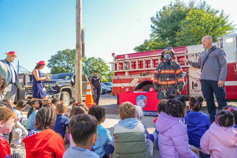 Firefighters demo gear to students
