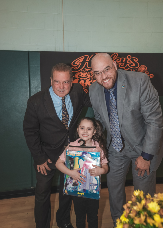 Mayor and Superintendent with student