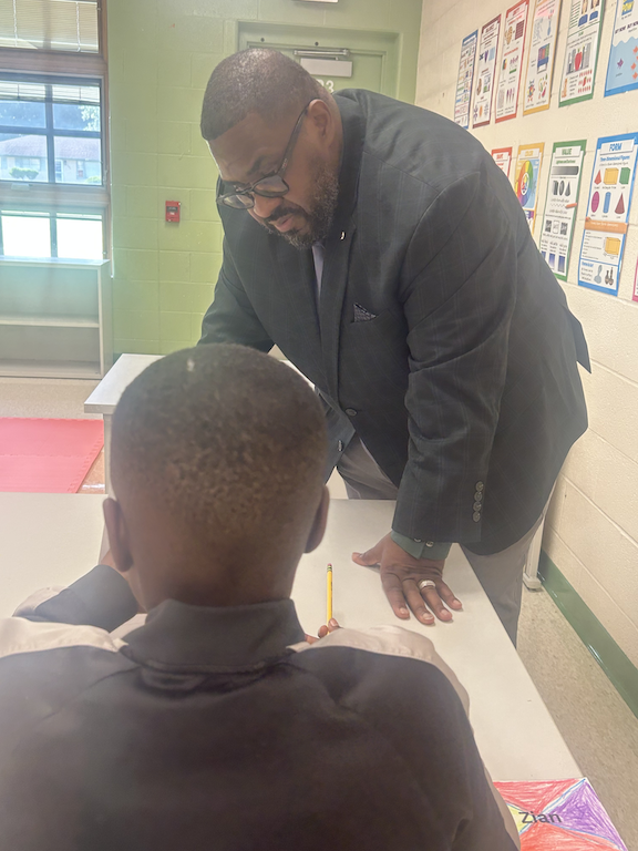 jeremy batchelor with student 
