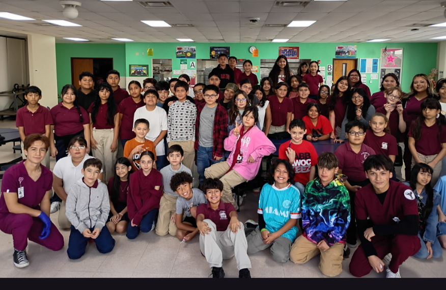 Ysleta High School Biomedical pathway students post with all our 5th grade students