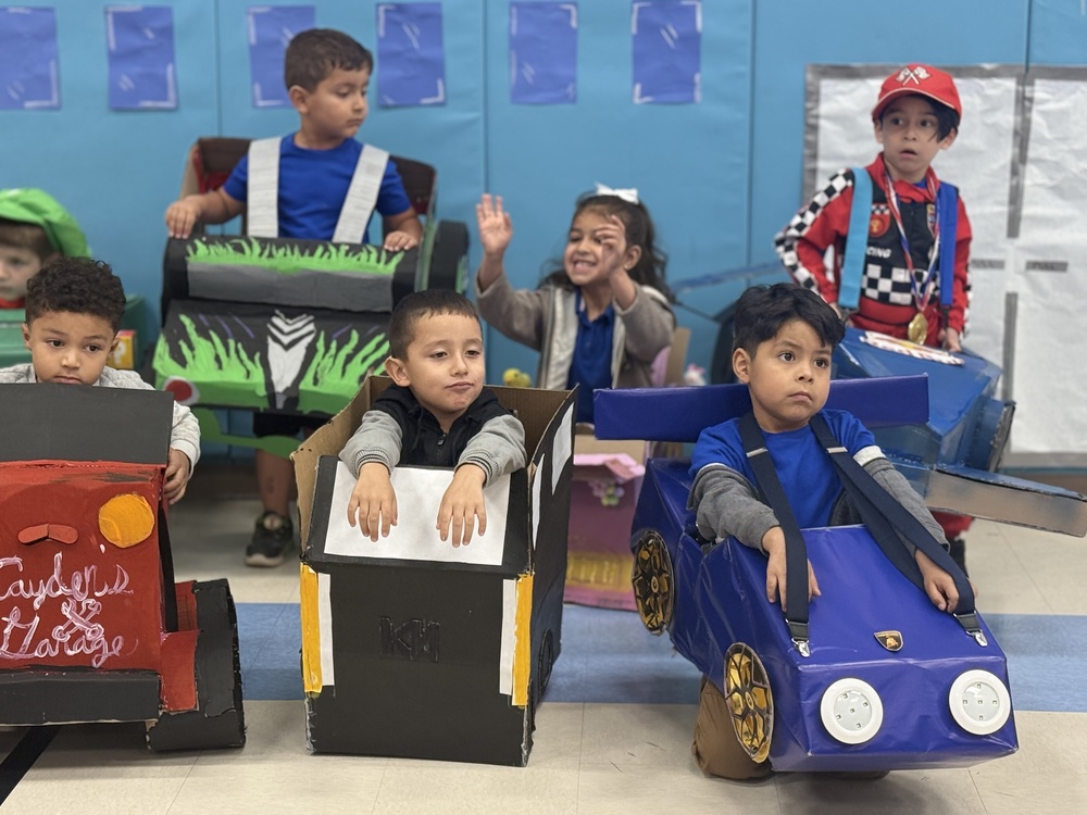 Student Posing with a Firetruck