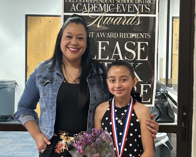 UIL winner and Ms. Hernandez her  sponsor posing during the award ceremony