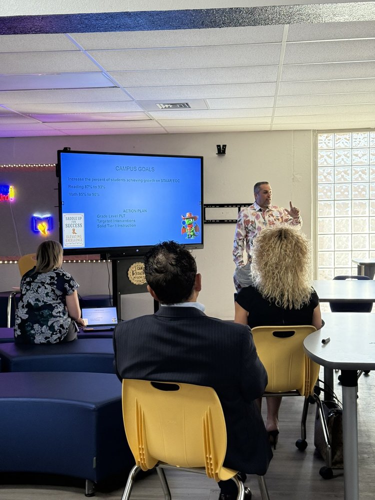 Mr. Puga presenting to parents and community members during Coffee with the Principal meeting.
