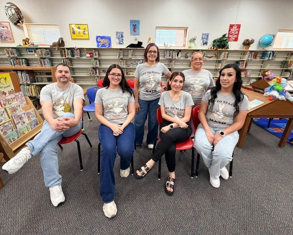 Quack, quack… look who’s flocking together. This is an image of teachers getting together with their duck shirts.
