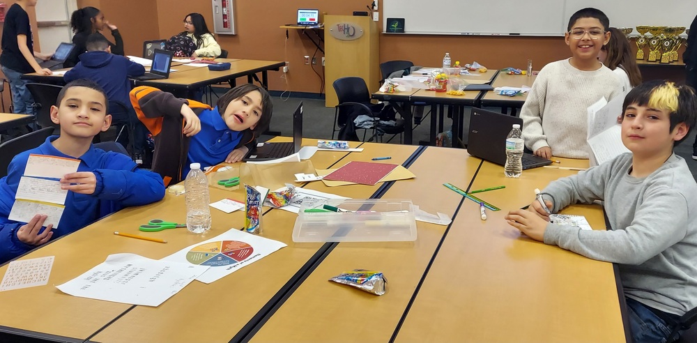 Students pose for a picture competing for Q-BEC Finals 