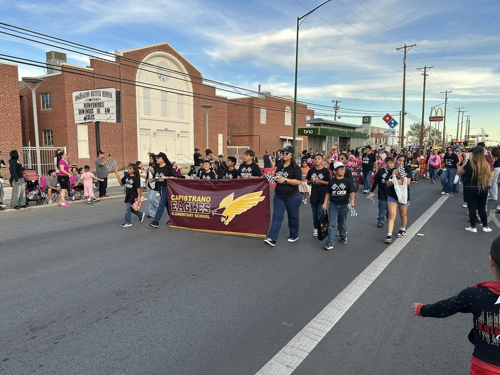 capi kids march in a parade