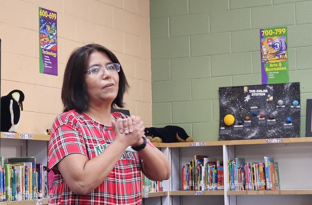 Teacher of the Year Ms. Calderon thanking Presa for the selection