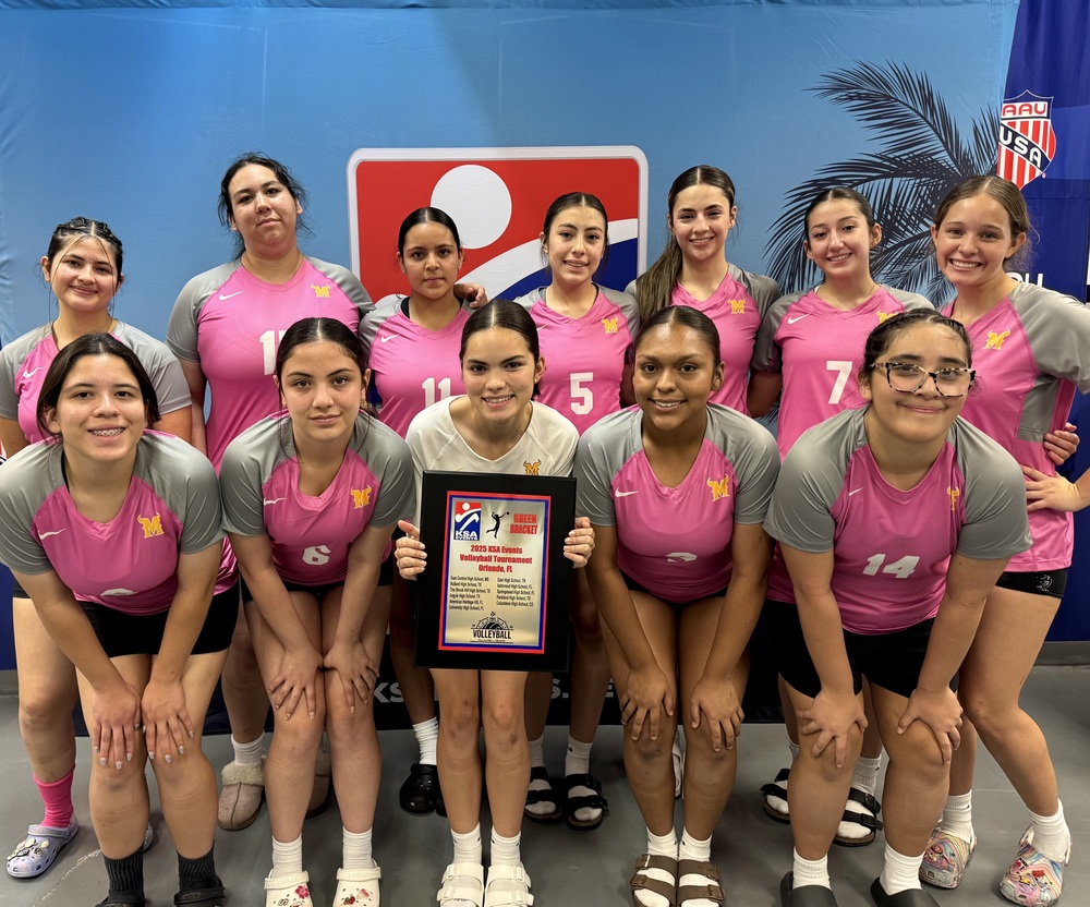 Lady Matadors pose with award for 4th place at volleyball tournament