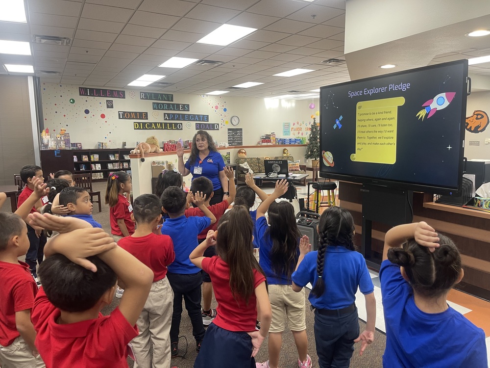 Counselor giving a lesson to students