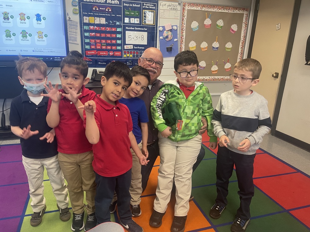 Principal for the day with students