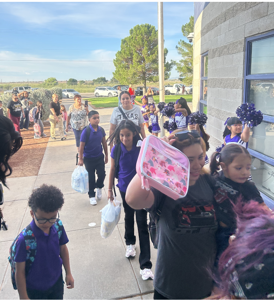 Students in front of school