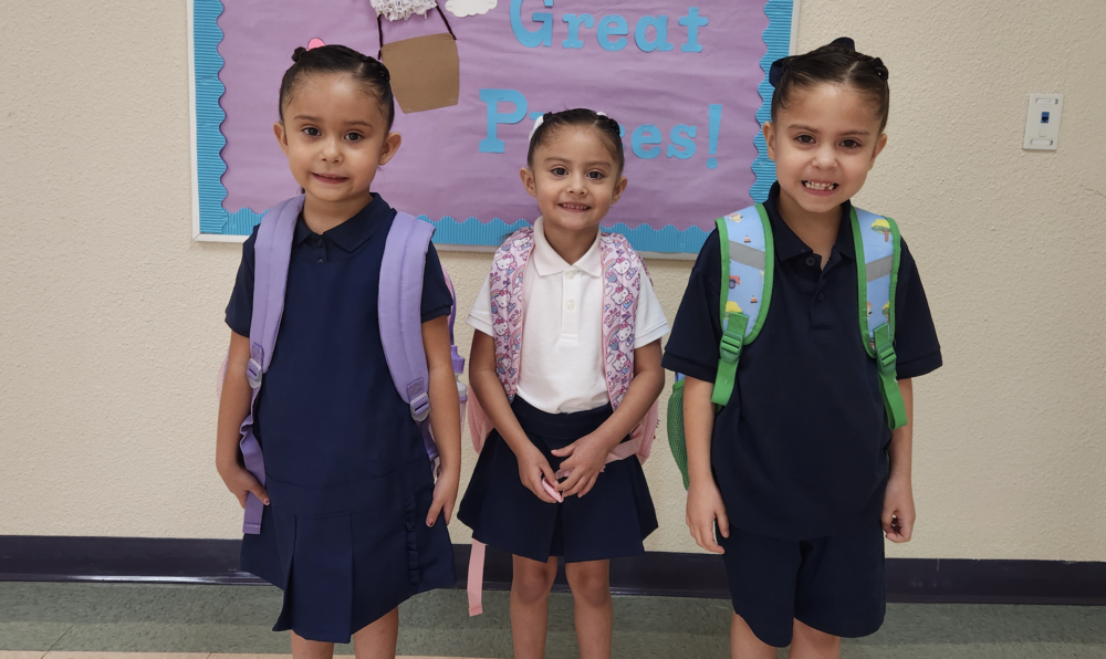 sisters on their 1st day of school