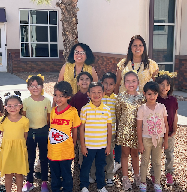 Teachers and students raise awareness for Children's Cancer by wearing yellow and gold.