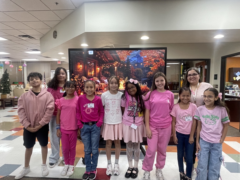 Students wearing pink in honor of breast cancer awareness week