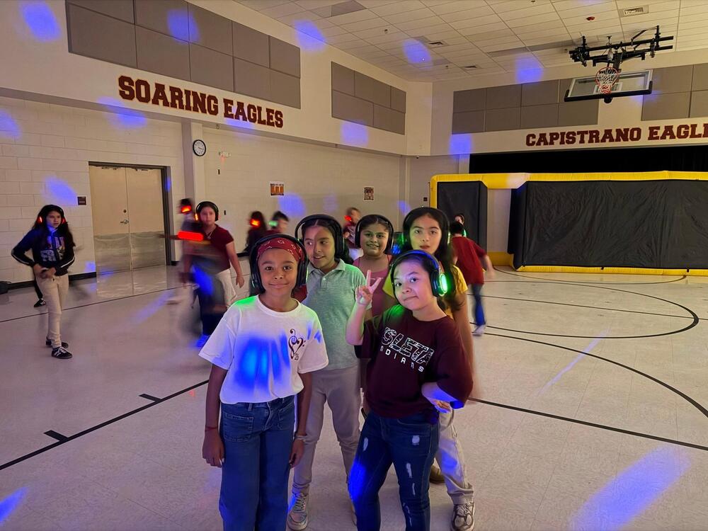 Students attending a silent disco dance.