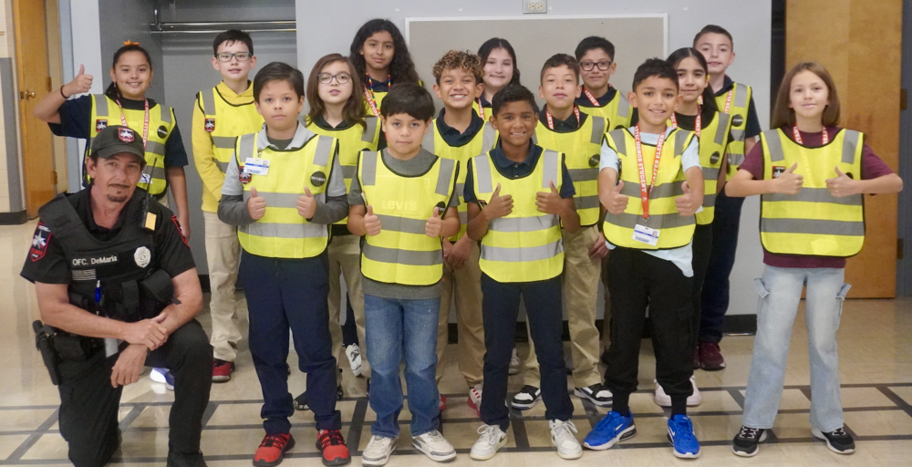 Junior Security Officers taking a picture.