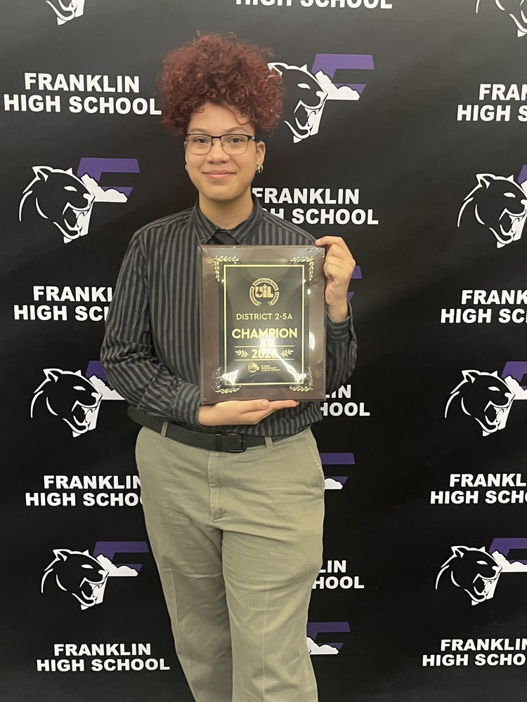 Parkland High School student, Azra Rios-Carroll, holds the District 2-5A Champion plaque for UIL