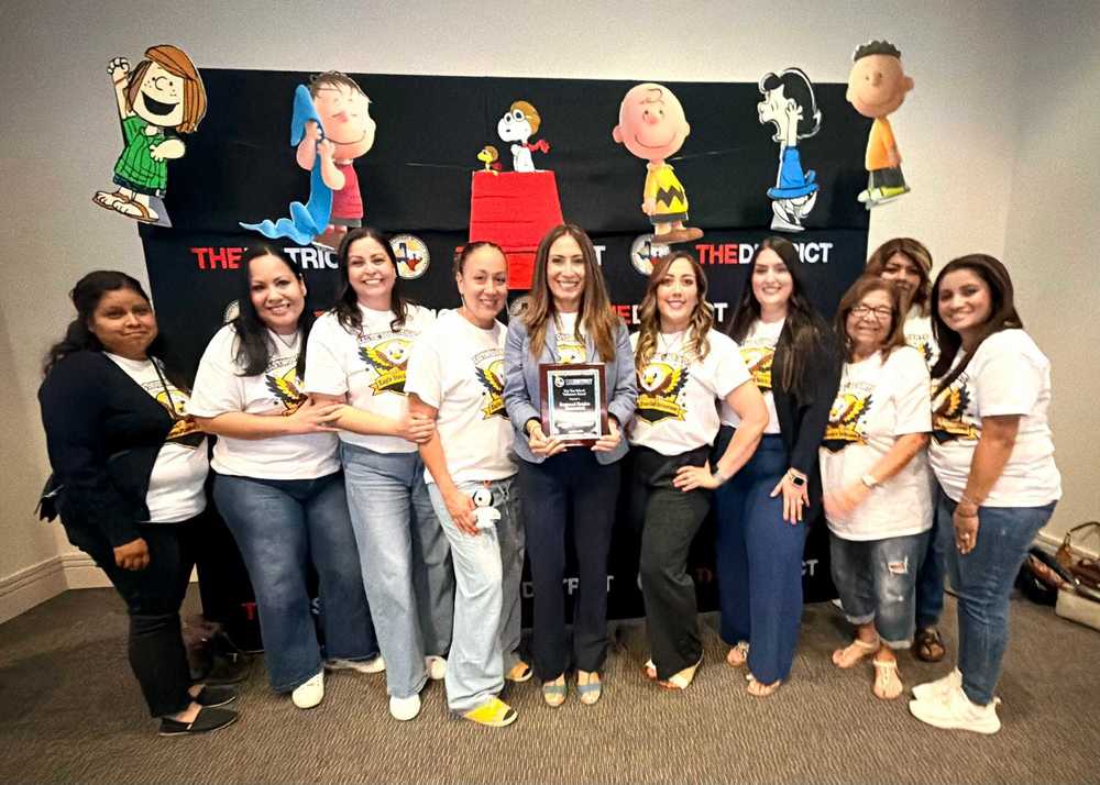 Holding award for most volunteer hours