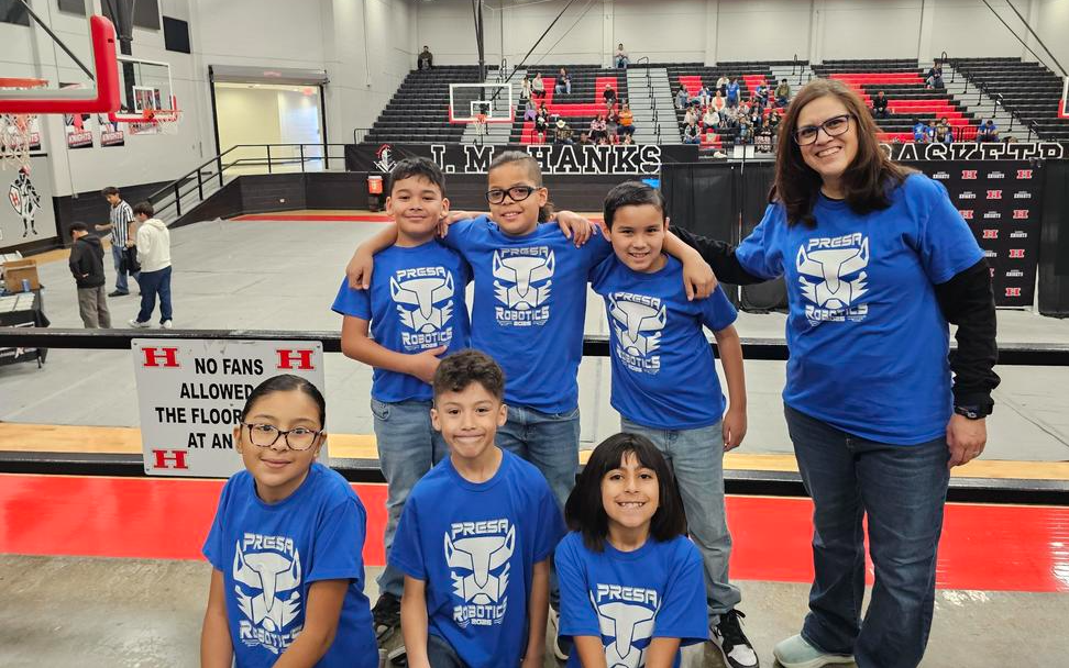 Presa Robotics Teams B and Z with Coach Loya in the gym