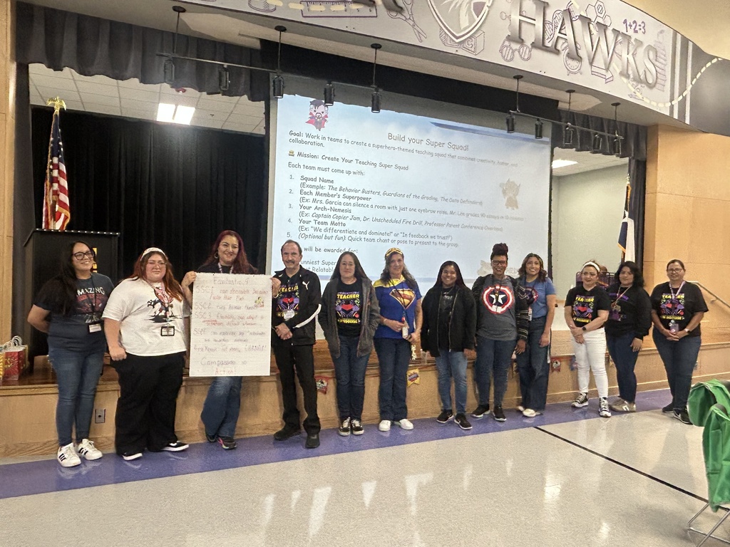Teachers holding Super Power Poster