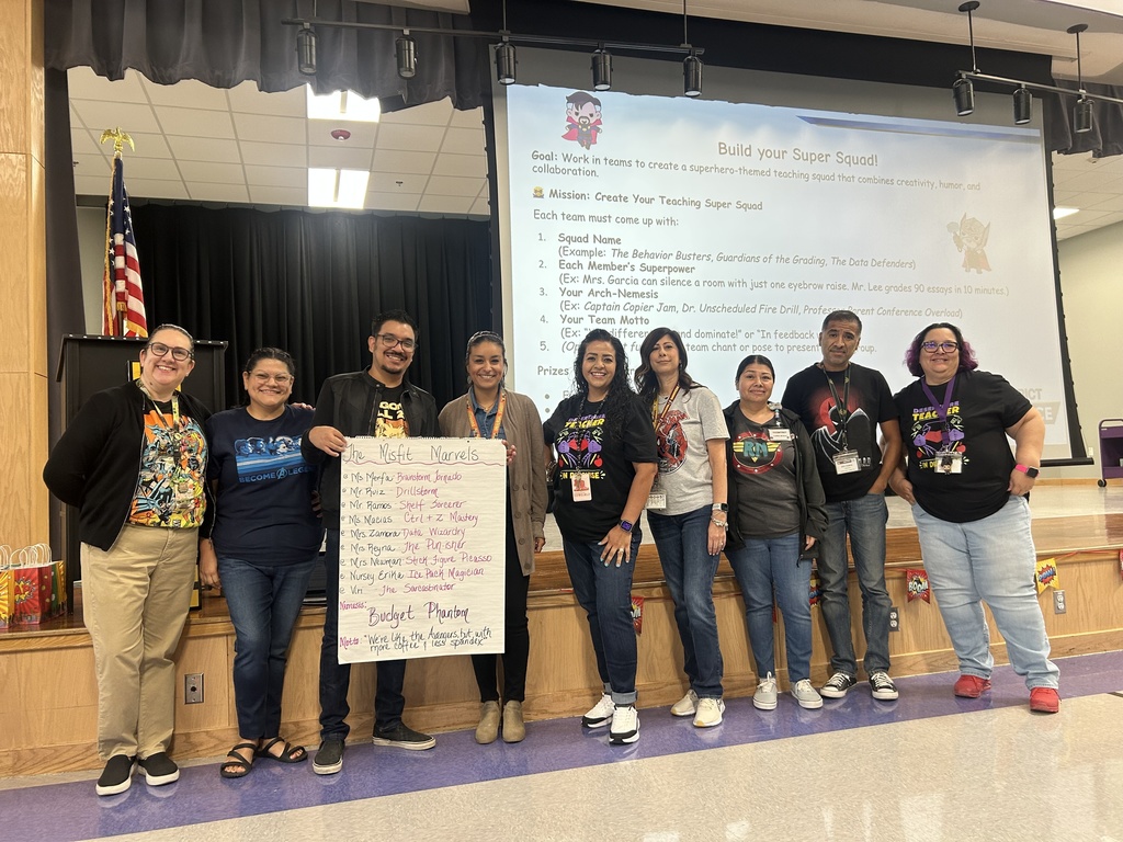 Leadership team holding Super Power Poster