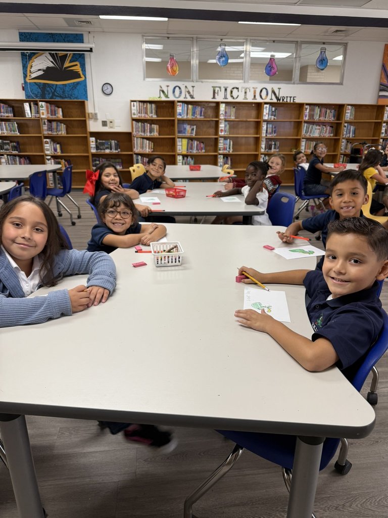 Students illustrating and writing what not to do at school.