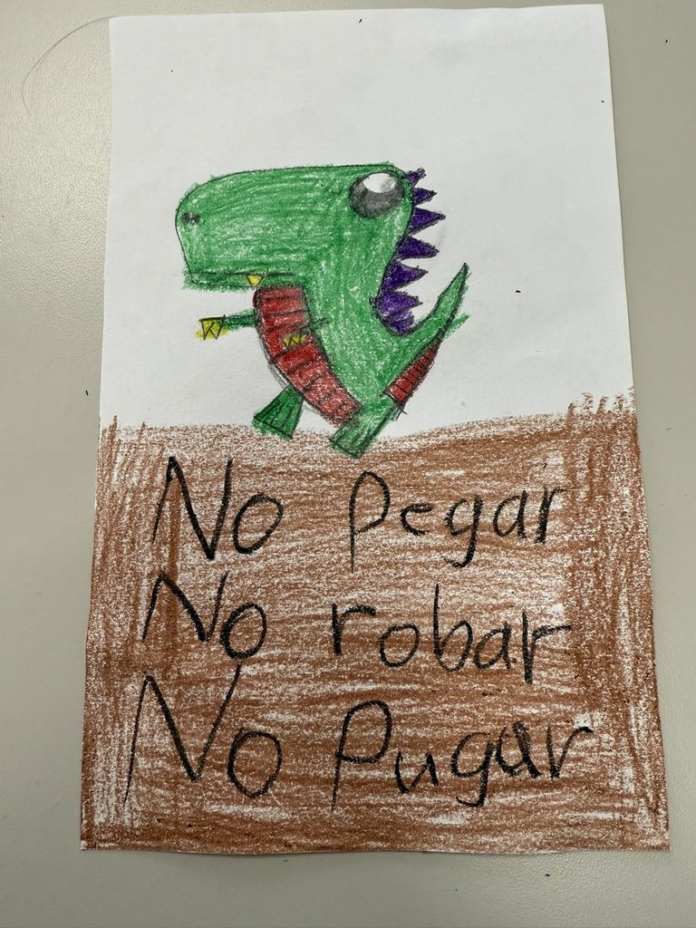 A Photo of a student illustration of a dinosaur.