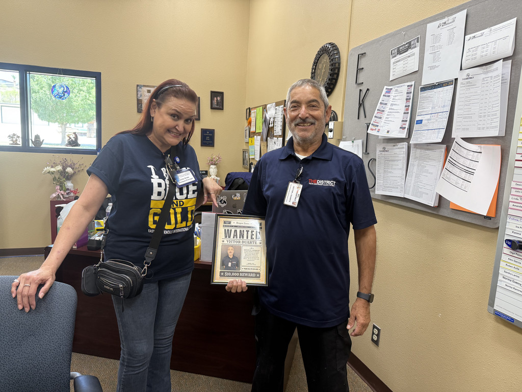 Photo of Victor receiving the Faculty member of the Month recognition.