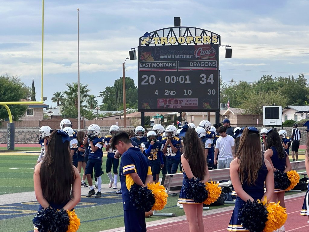 Photo of EKIS football players and cheer team.