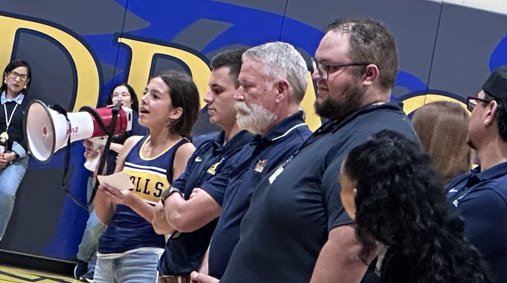 Photo of EKIS student celebrating in a parade and pep rally.