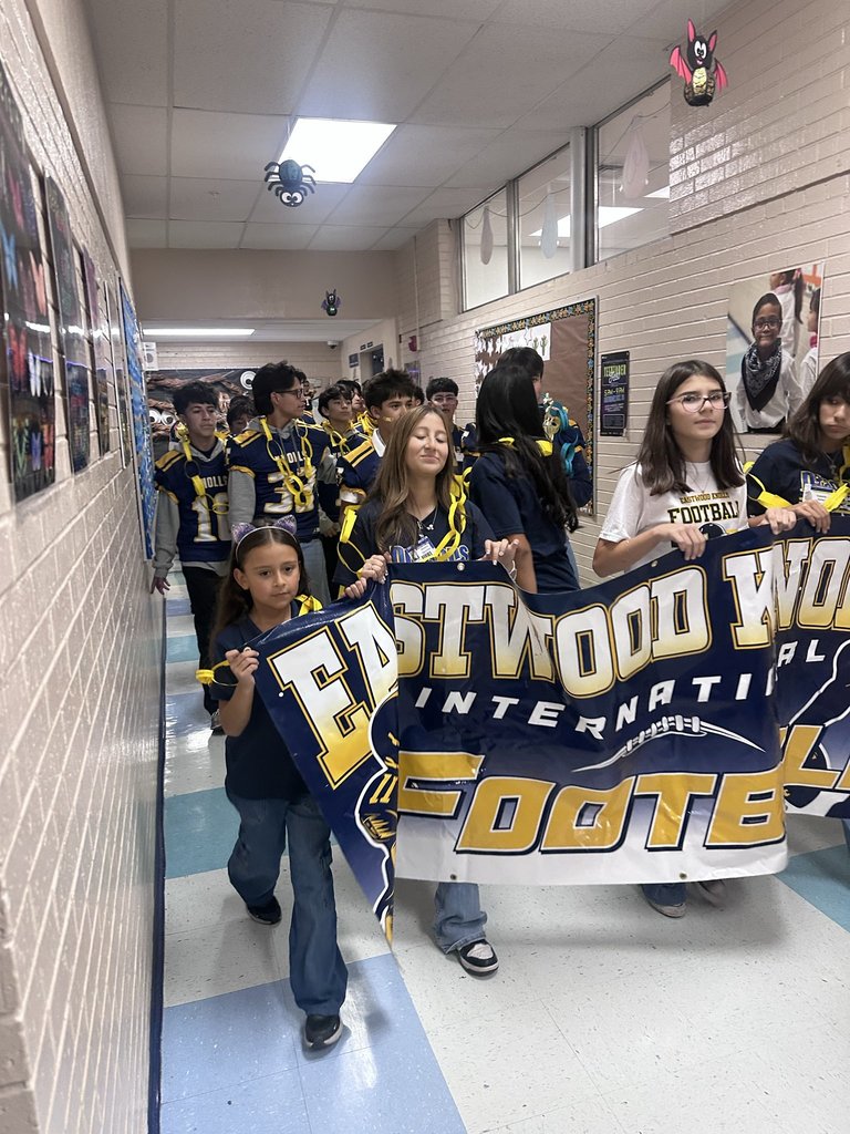 Photo of EKIS student celebrating in a parade and pep rally.