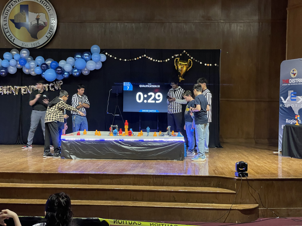 Photo of EKIS robotics team at a robotics tournament.