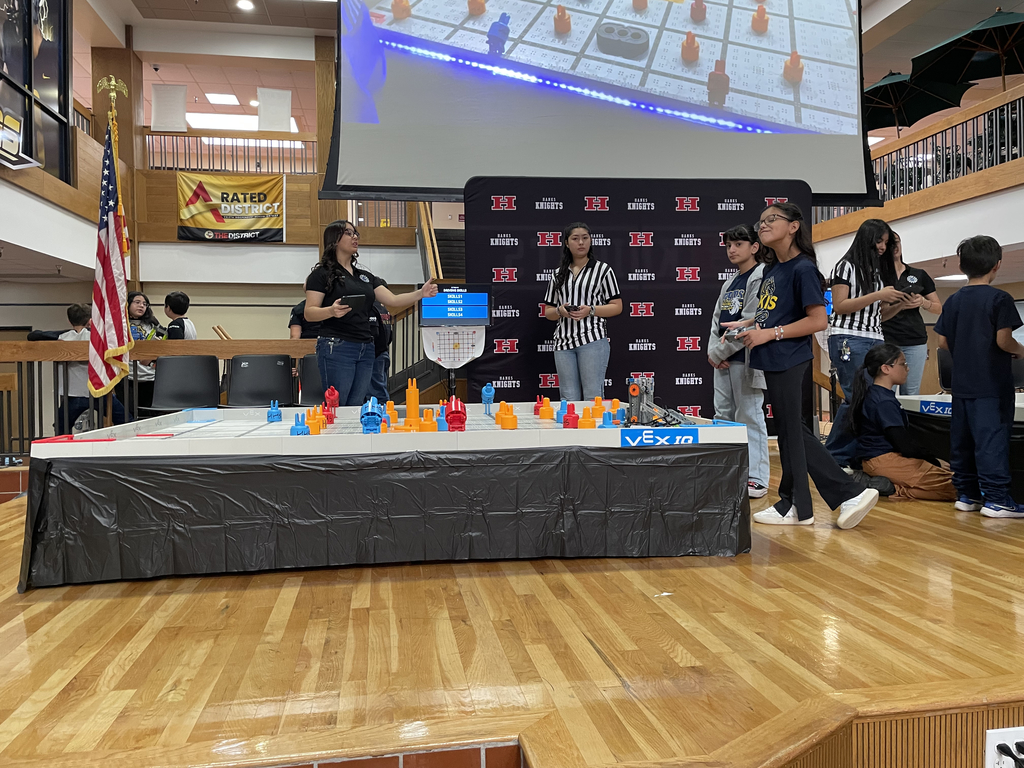 Photo of EKIS robotics team at a robotics tournament.