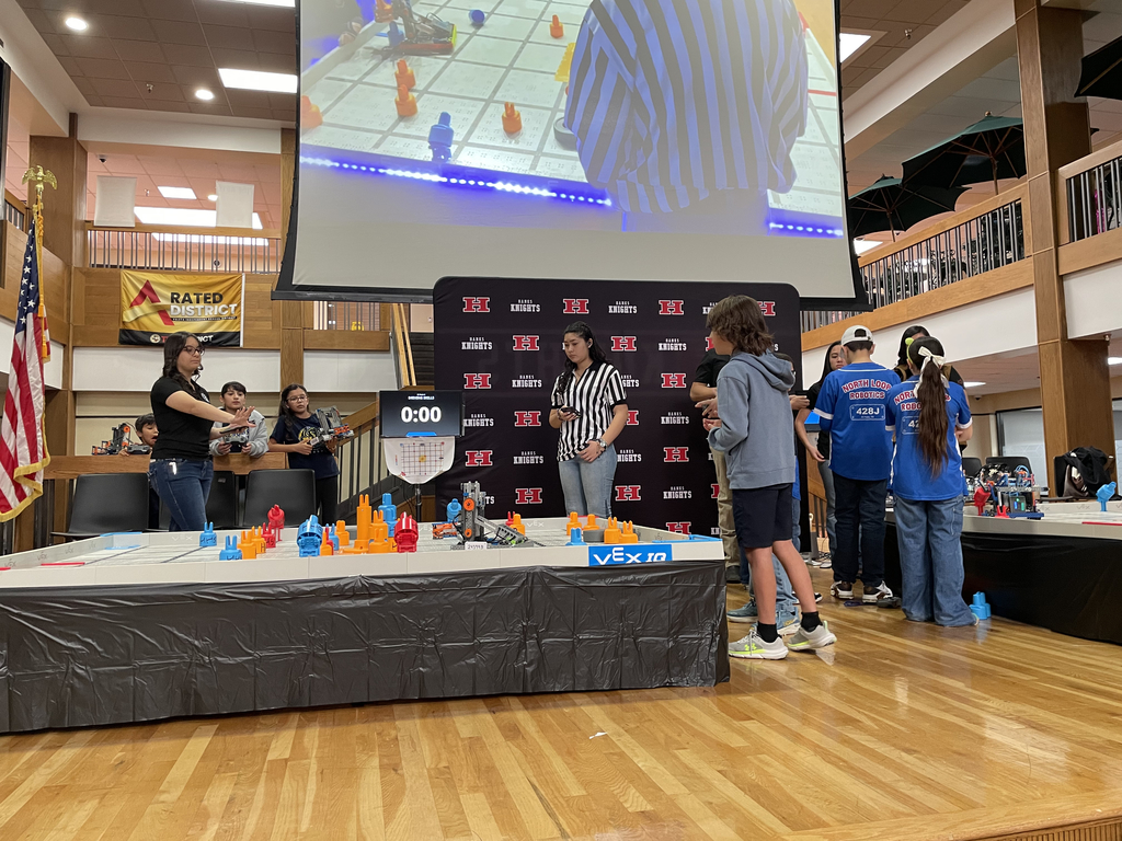 Photo of EKIS robotics team at a robotics tournament.