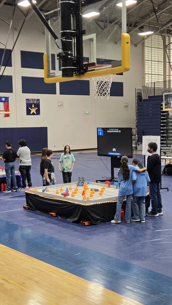 Photo of EKIS students at a robotics competition.