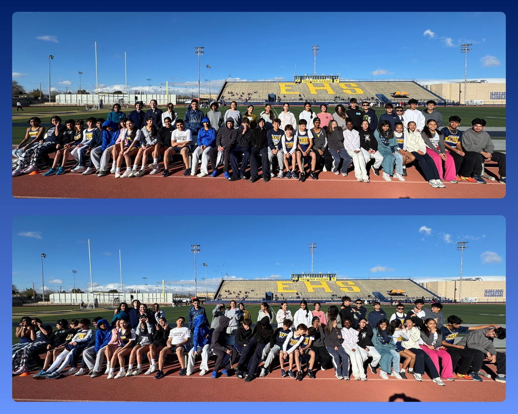 Photo of EKIS track team members at a track meet.
