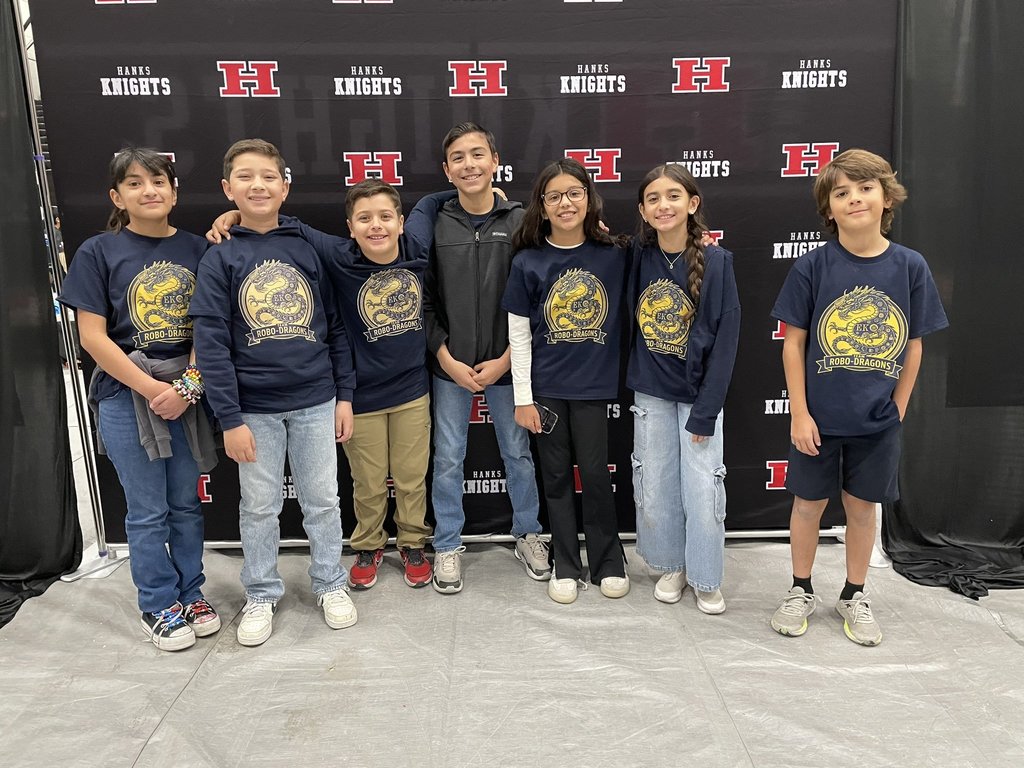 Photo of EKIS students at a VEX IQ robotics competition.