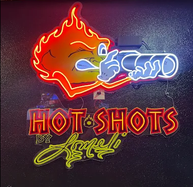 Logo for Hot Shots by Lomeli 