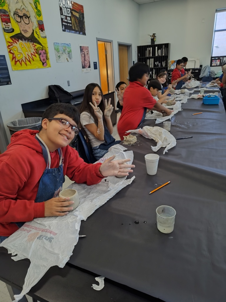 Students in Mr. Borunda's Art Class creating clay pinch pots and digital radial mandalas